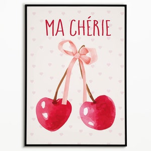 May include: A pink and white watercolor illustration of two cherries tied together with a pink ribbon. The text "MA CH&Eacute;RIE" is written in red above the cherries.