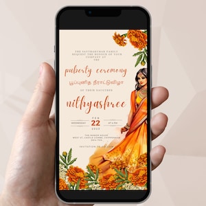 May include: A digital invitation for a puberty ceremony, featuring a woman in a traditional orange and yellow sari, surrounded by marigold flowers. The text reads "puberty ceremony" and "nithyashree". The date is Wednesday, February 22, 2023.