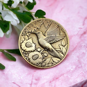 Graceful Flutter - Brass Coin with Hummingbird and Floral Delight (Double-Sided)