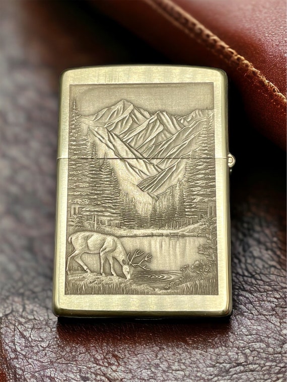 Nature's Majesty: Brass Zippo Lighter with Mountains and Deer Engraving
