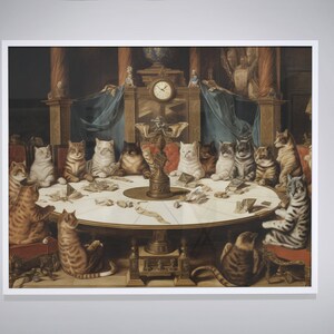 May include: A painting depicting a group of cats gathered around a table, playing cards. The cats are dressed in formal attire and are seated in a room with a clock and other decorative items. The painting is framed in white.