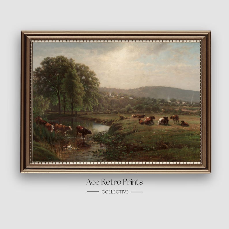 May include: A vintage painting depicting a pastoral scene with a stream running through a field. The painting features a group of brown and white cows grazing in the field, with a lush green forest in the background. The sky is a light blue with fluffy white clouds.