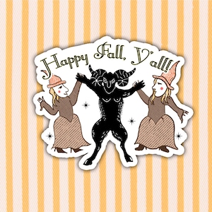 May include: A sticker with a whimsical illustration featuring a black goat-like figure between two figures in brown dresses and orange hats. The text "Happy Fall, Y'all!!!" is arched above the figures. The background has vertical orange and white stripes.