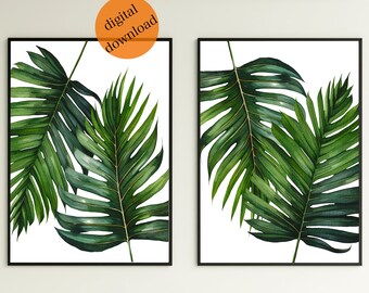 May include: Two framed prints of watercolor illustrations of tropical palm leaves on a white background. The leaves are green and have a realistic texture.