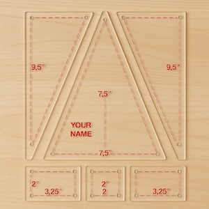 May include: Clear acrylic quilting templates with red dashed lines and measurements in inches. Includes two triangles (9.5" sides, 7.5" base), two rectangles (3.25" x 2" and 2" x 2"), and a triangle (7.5" base). Text: "YOUR NAME".