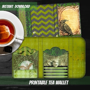 May include: Printable Halloween tea wallet featuring a green, black and white colour scheme. The wallet has two pockets with images of bats, spiders and a teacup. The text "Printable Tea Wallet" is at the bottom of the image.