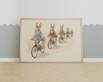 May include: Watercolor illustration of a framed print featuring a line of rabbits riding bicycles. The rabbits wear jackets in blue, brown, and green. The artwork has a vintage aesthetic and is set against a neutral background.