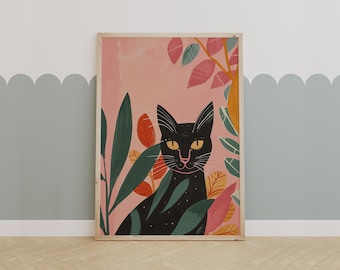 May include: A framed art print featuring a black cat with yellow eyes, surrounded by colorful foliage. The artwork has a pink background and a wooden frame. The leaves are green, orange, and pink, creating a vibrant and whimsical scene.