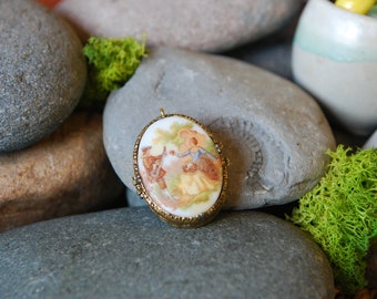 1960's Vintage solid perfume compact pendant designed by Marys Chess Inc with Fragonard painting..