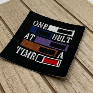 Broderad BJJ-lapp: Ett bälte i taget, stryk-på