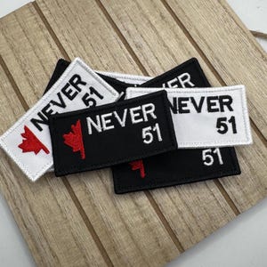 Never 51, Canadese vlag: geborduurd esdoornblad, opstrijken/naaien