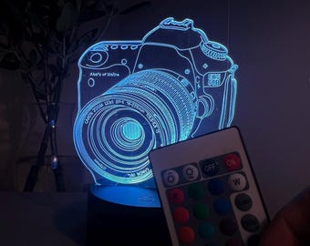 Luz nocturna con cámara 3D: Lámpara LED que cambia de color con control remoto