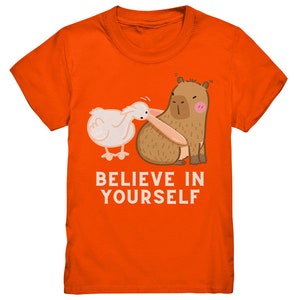 Glaube an dich, witziges Capybara Kinder Shirt, Geschenk Capybara Liebhaber, Geschenk Kindergeburtstag, Witziges Kindershirt trendig Orange