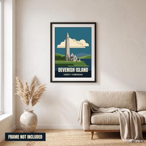 May include: A framed wall art print featuring a stylized illustration of Devenish Island with a tall stone tower, green hills, and a blue sky with cream clouds. The text at the bottom reads DEVENISH ISLAND COUNTY FERMANAGH in bold letters.
