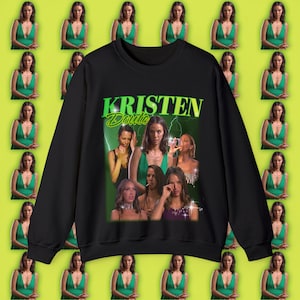 May include: Black sweatshirt with a green graphic print of the text "KRISTEN Doute" and a collage of images of a woman.