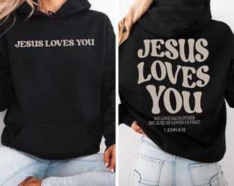Jesus Loves You Sweatshirt, Jesus Saves Hoodie, Christian Bible Verse Pullover, Faith Based Christian Gift, 1 John 4 19 Religious Hoodie