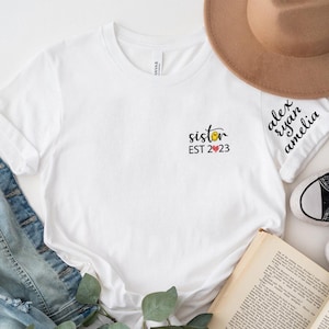 Personalized Sister Shirt with Siblings Names on Sleeve, Siblings Names Sleeves Printed Custom New Sister Shirt, Sister Est Gift Shirt