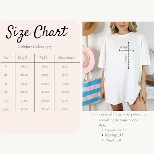 May include: A white t-shirt with a size chart and text. The size chart shows measurements for length, width, and sleeve length in inches. The model is wearing a 2XL shirt and is 5'8".