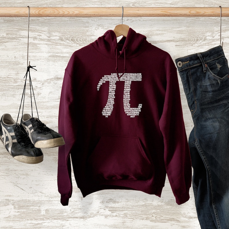 May include: Burgundy hooded sweatshirt with a white graphic of the mathematical constant pi, formed from the digits of pi.