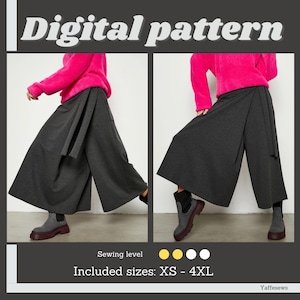 Op de afbeelding: Een digitaal naaipatroon voor een wijde broek met een wikkelgesp. De broek is getoond in een donkergrijze stof en is gestyled met een felroze trui. Het patroon omvat maten XS-4XL en wordt beschreven als een naaipatroon voor beginners.