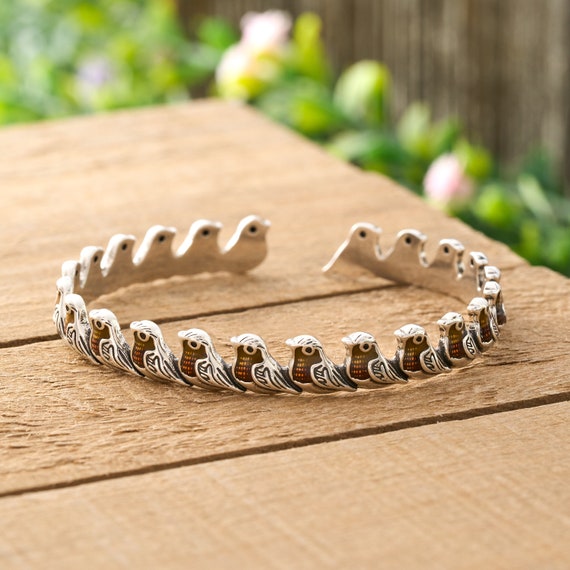 Silver robin bracelet discount