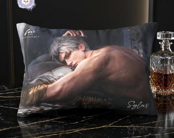 May include: A rectangular pillow featuring a printed image of a person with silver hair, resting on a bed. The pillow has the text "Love and Deepspace" and the name "Sylus". A glass decanter is visible in the background.