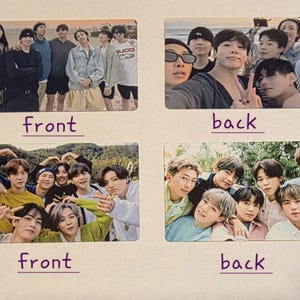 May include: Two sets of BTS photo cards. Each set has a front and back image. The front images show the group posing outdoors. The back images show selfies of the group. The cards are rectangular.