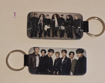 Kpop double sided leatherette key chains. OT7