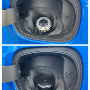 May include: Close-up of a blue car's gas tank flap open, showing a silver gas cap in the first image and a black gas cap in the second image.