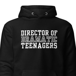 May include: Black hooded sweatshirt with white text that reads "Director of Dramatic Teenagers".