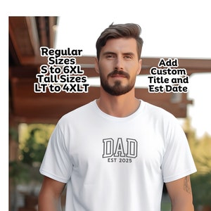 May include: White t-shirt with a black and gray "DAD EST 2025" graphic. Hanes Beefy T in 12 colors. Regular sizes S to 6XL and tall sizes LT to 4XLT.