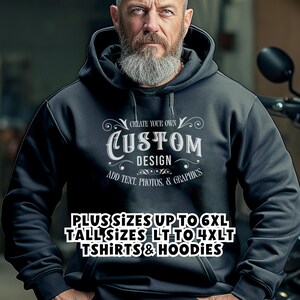 May include: A black hooded sweatshirt with the text "CREATE YOUR OWN CUSTOM DESIGN" in white. The text "ADD TEXT, PHOTOS, & GRAPHICS" is below the main text. The bottom of the sweatshirt has the text "PLUS SIZES UP TO 6XL, TALL SIZES LT TO 4XLT, TSHIRTS & HOODIES".