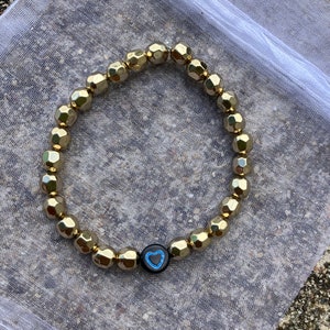 Golden Bead bracelet With Heart