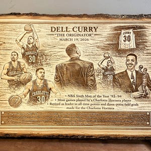 May include: A rectangular wooden plaque with live edges featuring laser-engraved images of Dell Curry in basketball jerseys and a suit, a jersey with number 30, and text detailing his career achievements and a congratulatory message to the family.