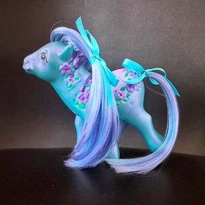 Blue iridescent Custom G1 resin My Little Pony with purple and green sculpted flowers