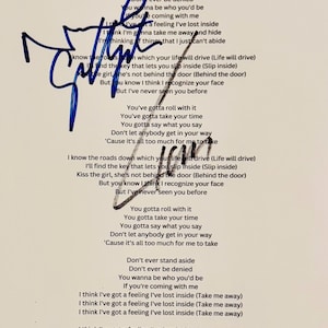 ノエル＆リアム・ギャラガーのサイン入り歌詞カード（証明書付き