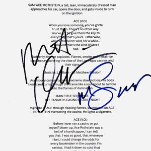 May include: A white page of a movie script featuring black printed text and two prominent blue ink signatures. The text includes scene headings like EXT. RESTAURANT PARKING LOT, LAS VEGAS, 1983 - DAY and dialogue from the character ACE (V.O.).