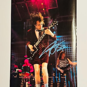 Angus Young Authentic Signed Calendar Photo With Certificate