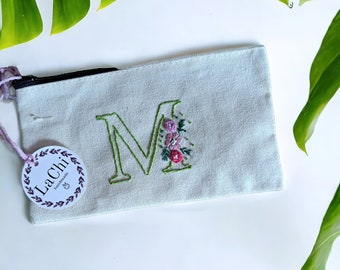 Clutch, cosmetic bag in hand-embroidered canvas with floral initials