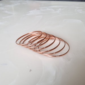 Set of 7 Copper Stacking Bangles: Semanarios Bracelets