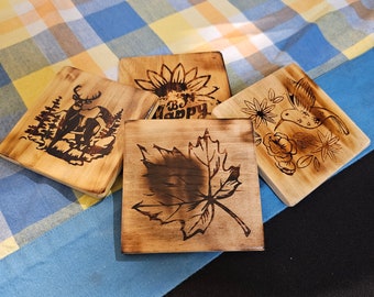 Coasters wood burned.