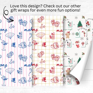 May include: Three rolls of gift wrap with different patterns. One has pink stripes with blue Mahjong tiles, dice, and fans. Another has a gold grid with red Mahjong tiles, dice, and fans. The third has Christmas-themed elements.