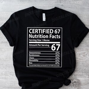 May include: Black t-shirt featuring a white graphic that mimics a nutrition label. The graphic states "CERTIFIED 67 Nutrition Facts" and lists qualities like "Awesomeness" and "Randomness" at 67%. The shirt is made of a soft material and is suitable for casual wear.