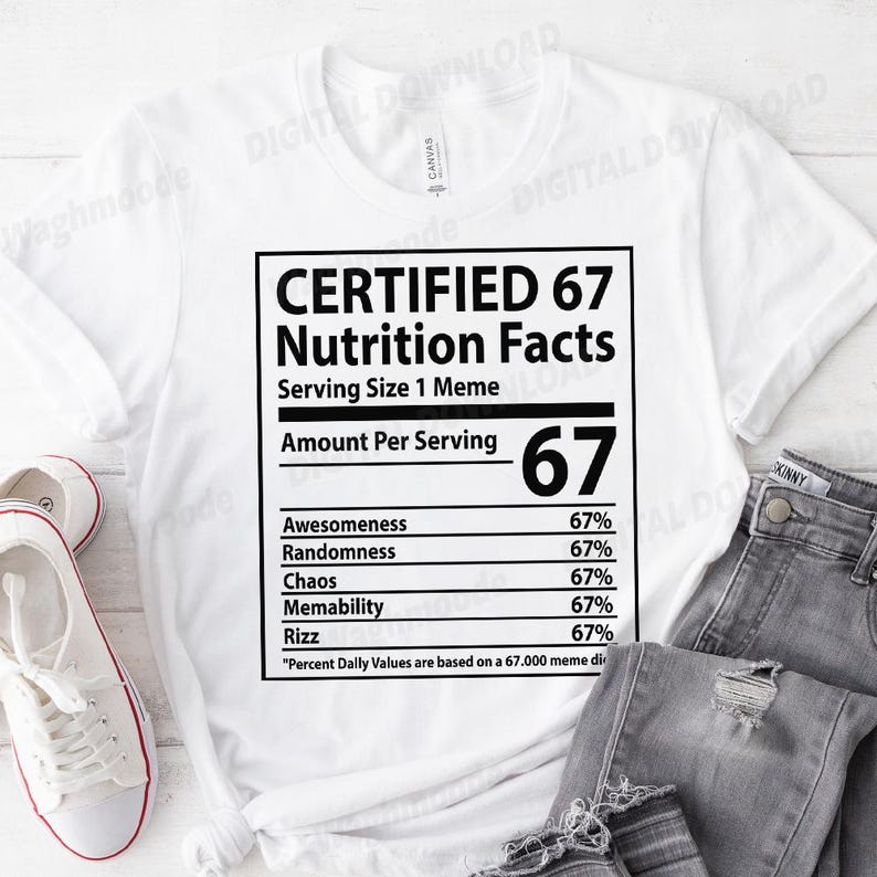 May include: White t-shirt featuring a black graphic designed as a nutrition facts label. The label humorously lists "Awesomeness" and "Rizz" at 67%. The text reads "CERTIFIED 67 Nutrition Facts". The shirt is displayed with jeans and white trainers.