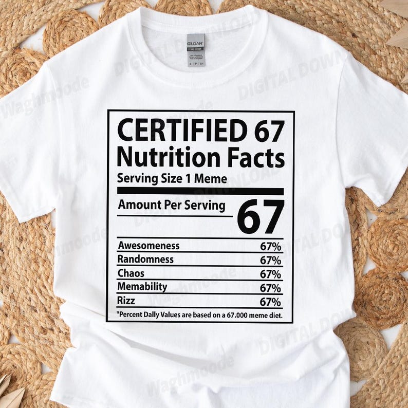 May include: White t-shirt featuring a black graphic designed as a nutrition facts label. The label states "CERTIFIED 67 Nutrition Facts" with percentages for Awesomeness, Randomness, Chaos, Memability, and Rizz. The shirt is made of a soft material.