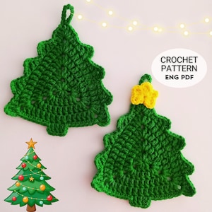 May include: Two green crocheted Christmas tree ornaments. One has a loop for hanging, the other has a yellow star on top. The image also includes a cartoon Christmas tree and the text "CROCHET PATTERN ENG PDF".