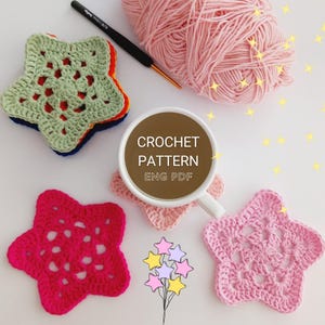 May include: Crochet pattern for star-shaped coasters in pink, green, and red. The pattern is available in English PDF format. The image also shows a ball of pink yarn and a crochet hook.