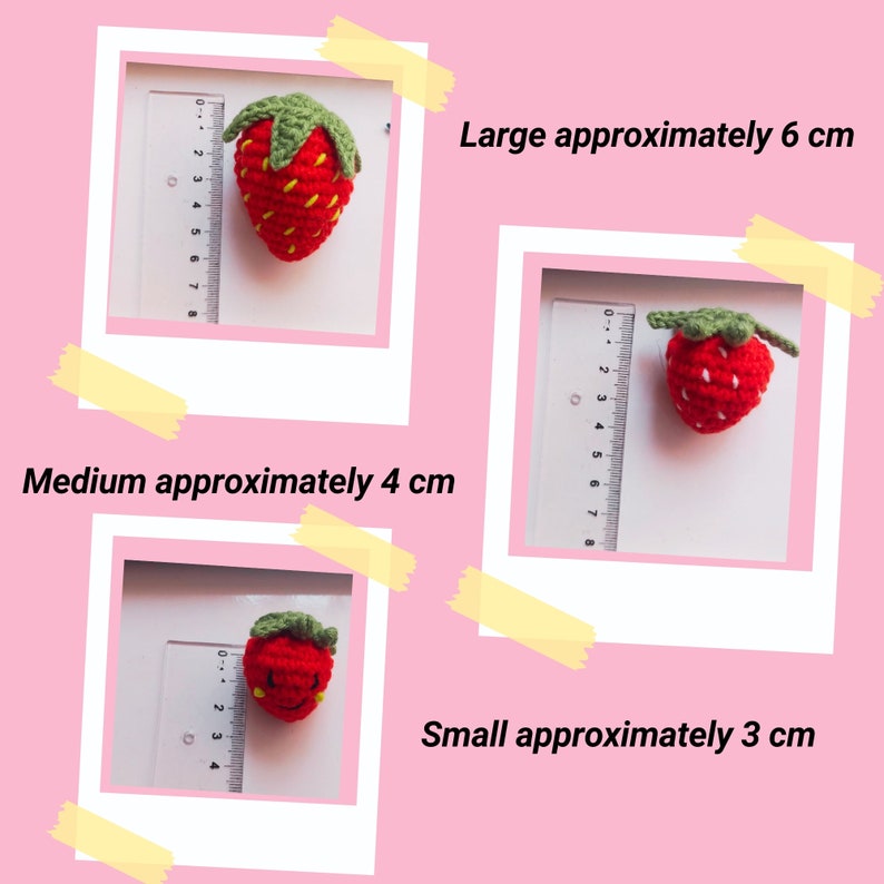 May include: Three crocheted strawberries of varying sizes: large (approx. 6 cm), medium (approx. 4 cm), and small (approx. 3 cm). Each strawberry is red with green leaves. The image includes text indicating the size of each strawberry.