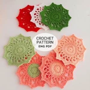 May include: Crochet pattern for a set of six coasters in red, white, green, and peach. The pattern is available in English PDF format.