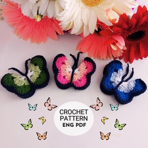 May include: Three crocheted butterfly appliques in green, pink, and blue with black outlines. Small butterfly decals in various colors surround the appliques. The text "CROCHET PATTERN ENG PDF" is in the center. Colorful flowers are in the background.